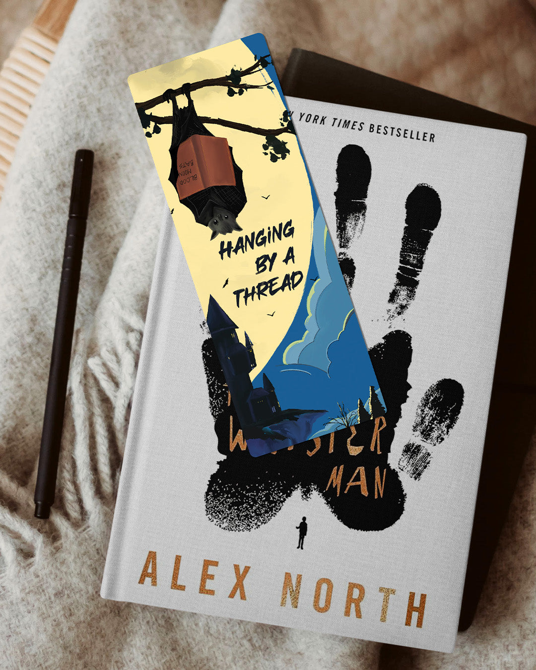 Hanging by a thread bookmark